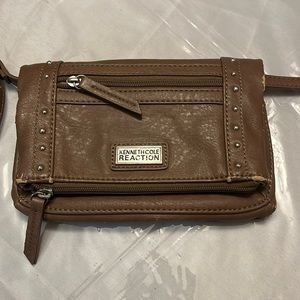 Kenneth Cole used crossbody that can comes with strap to become wristlet